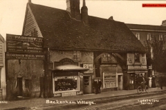 137-Padbury-Forge-and-Blacksmith-1st-left-Sweet-shop-laundry-and-Curio-Shoppe-You-can-see-The-Manor-House-behind-1904