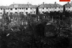 115-Widespread-WW2-bomb-damage-at-the-back-of-the-houses-between-Merlin-Grove-and-Eden-Park-Avenue
